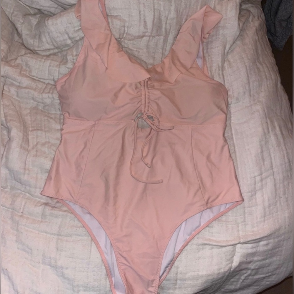 Light pink one piece swimsuit